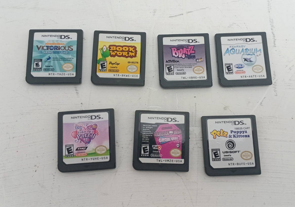 Nintendo DS lite pink console bundle w/ 7 games – Tested “read”