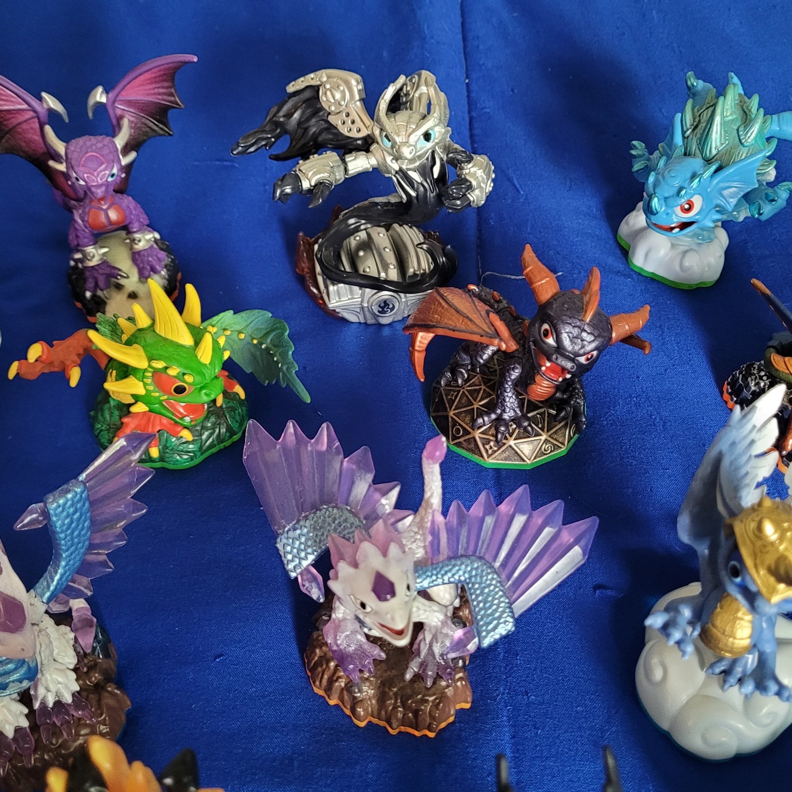 15 Assorted Skylander Figures And 3 Vehicles