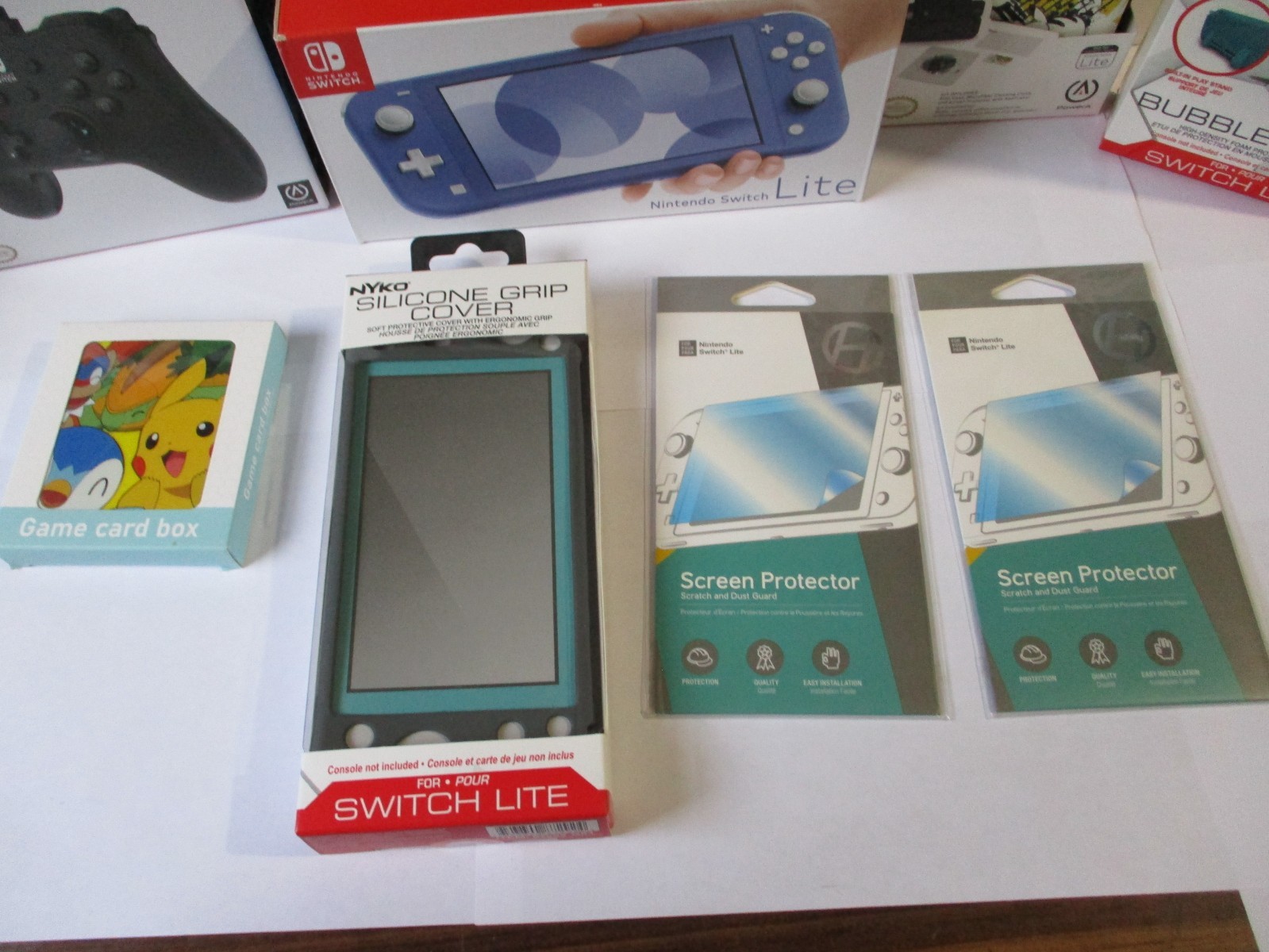 Nintendo Switch Lite – (Blue) Bundle W/ Games and Accessories All Brand New