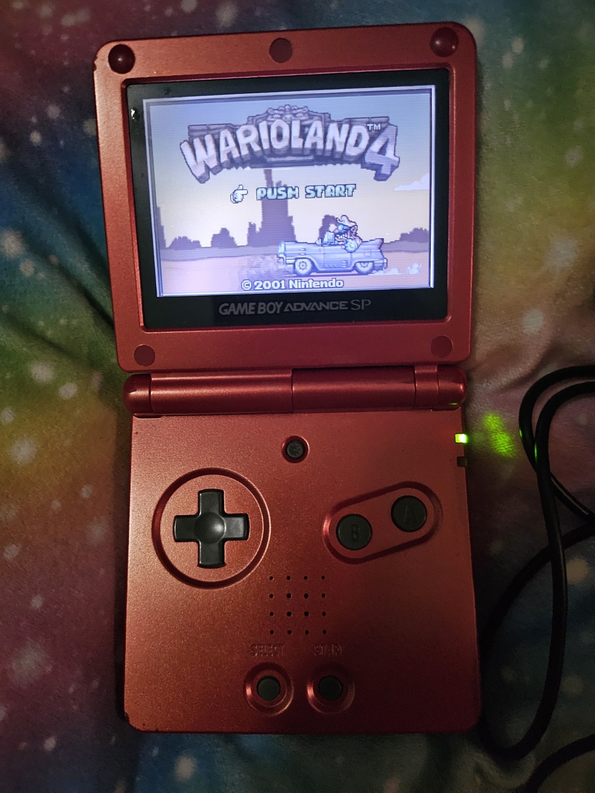 Nintendo Game Boy Advance SP with Charger & 1 Game Warioland 4- Tested Flame Red