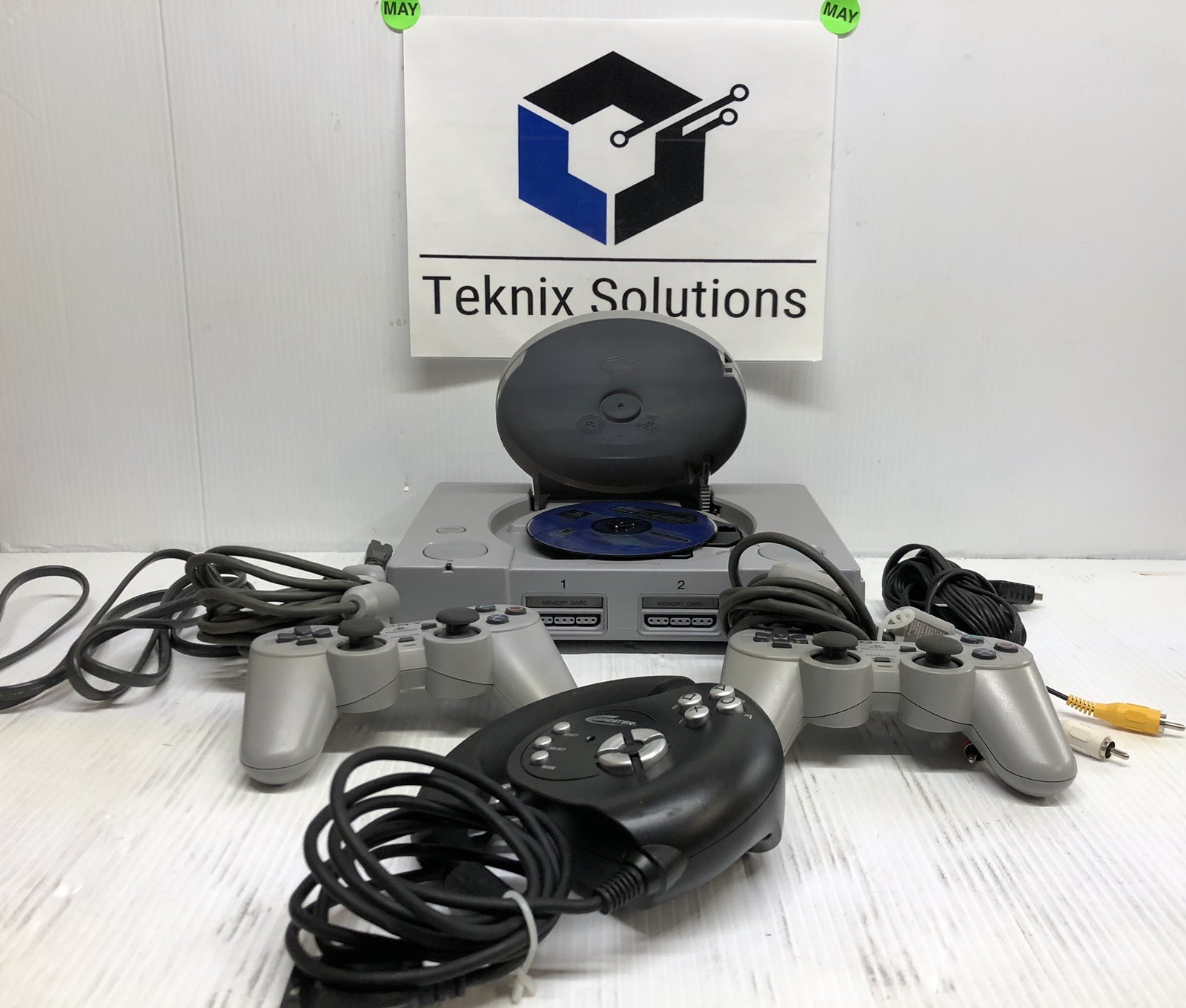 ORIGINAL PLAYSTATION 1 CONSOLE W/ CONTROLLERS TESTED WORKING GAME AND WHEEL LOT