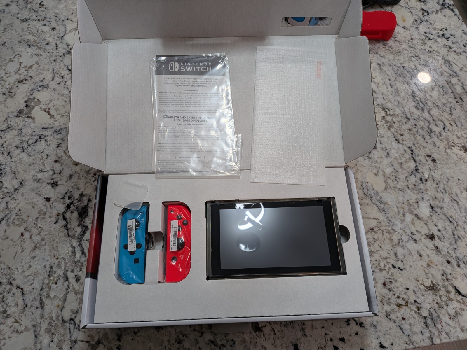 Nintendo Switch Console Black with Neon Blue & Red Joy-Con, Wi-Fi Capability