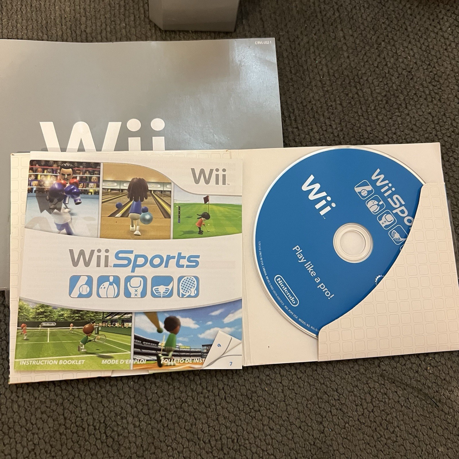 Nintendo Wii Console Bundle w/ Wii Sports, 2 Remotes, Nunchuks, Wheel & Manuals