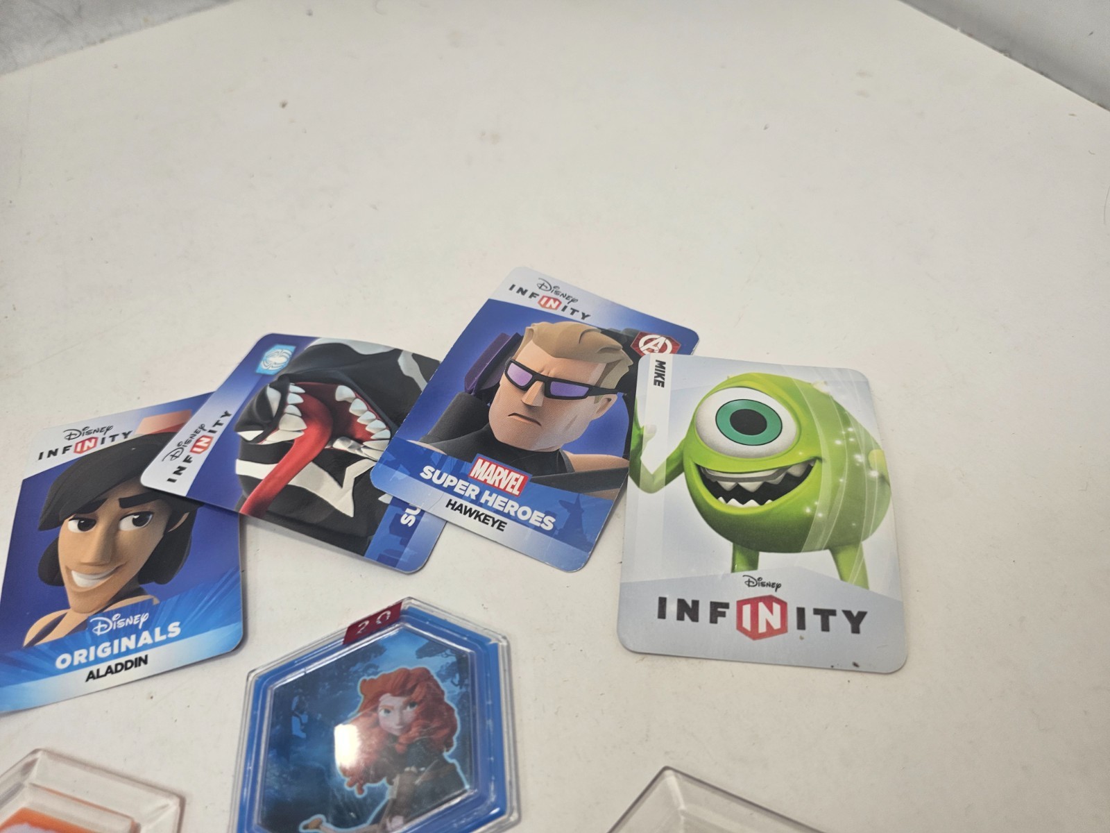 Disney Infinity Power Discs Cards Lot of 10 Merida Alice Aladdin Frankenweenie