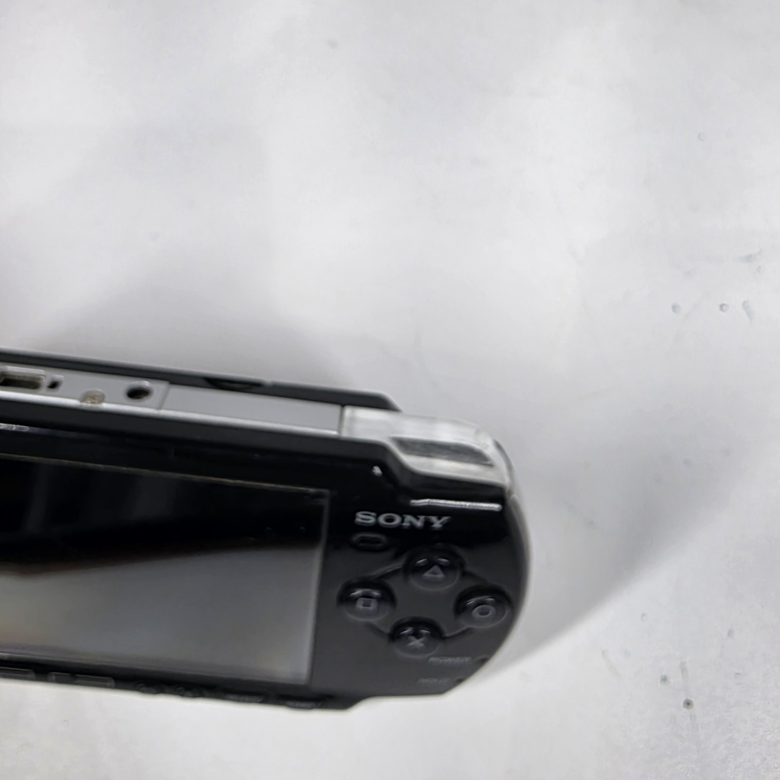 Sony PSP-2001 Slim Edition Black w/ Charger & Need For Speed Carbon – No Battery