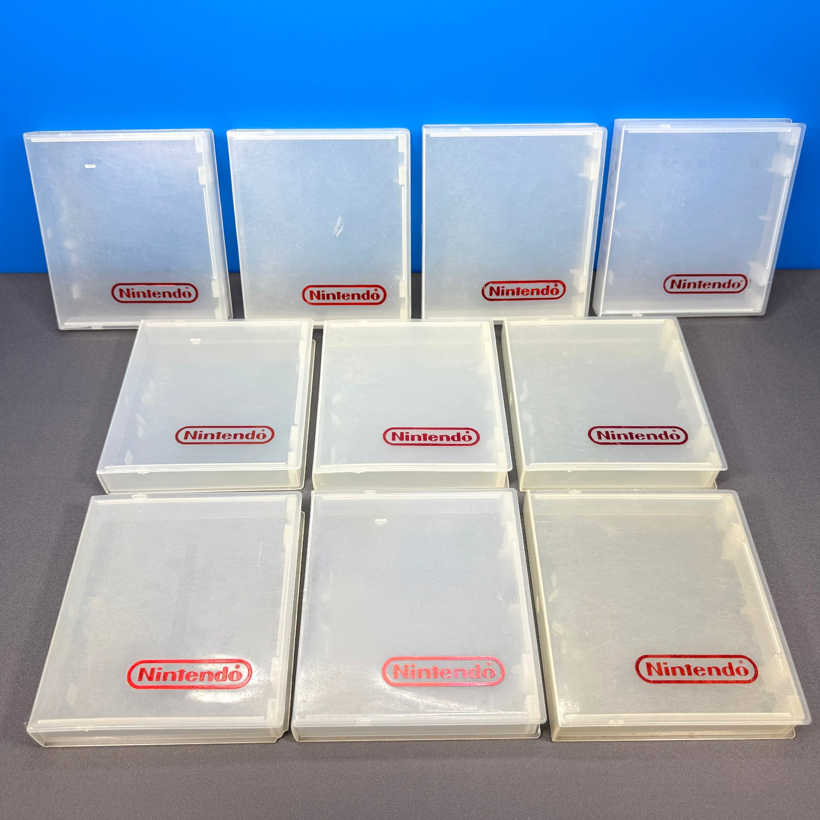 LOT OF 10 NINTENDO NES GAME HARD PLASTIC CLAMSHELL CASE CASES CLEAR RED LOGO OEM
