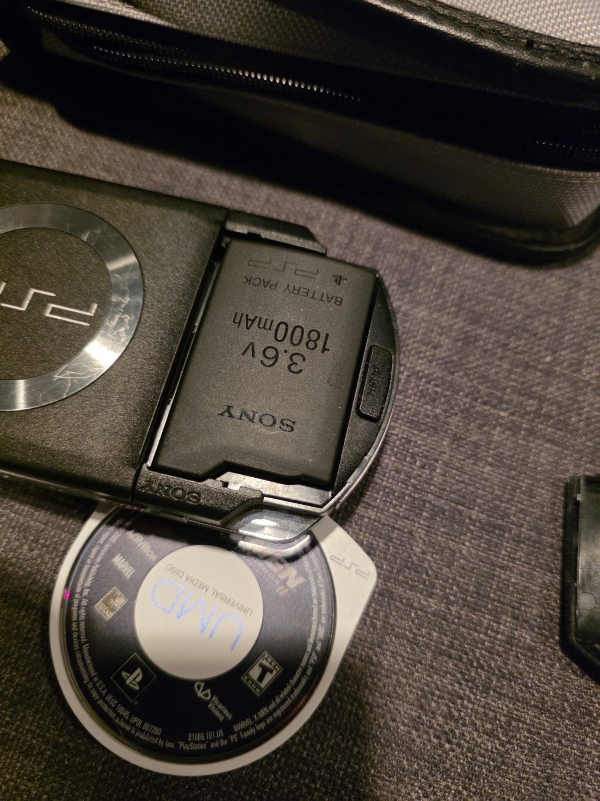 Sony PSP-1001 Black, Oem Charger, 5 Games – Darkstalkers, Xmen, Twisted Metal