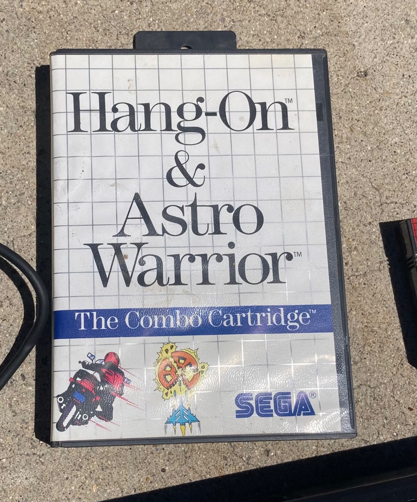 2 sega master system consoles with 3 controllers and games (not sure if it works