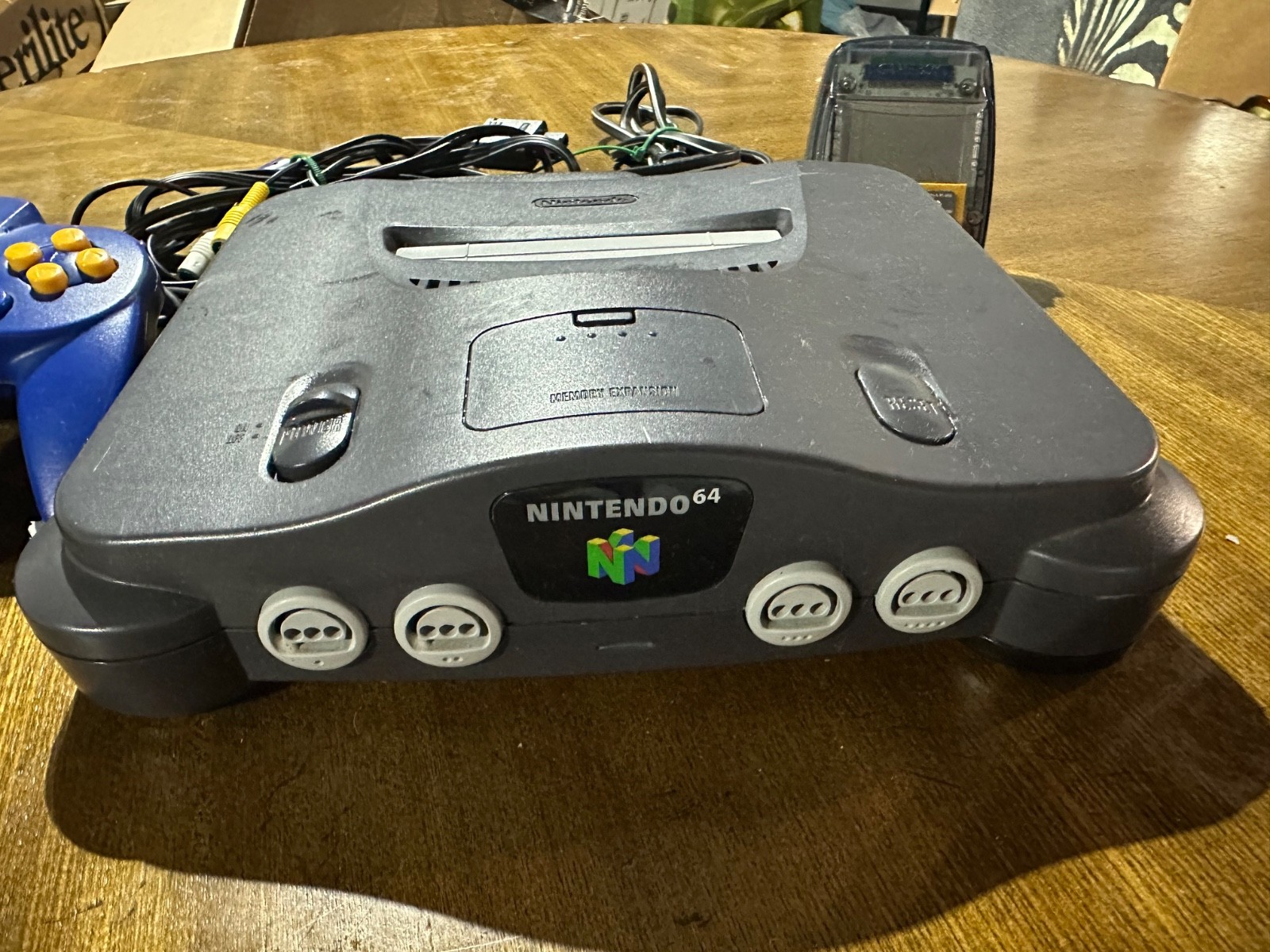 Nintendo 64 Home Console – Black With Cords, Blue Controller, and Transfer Pack