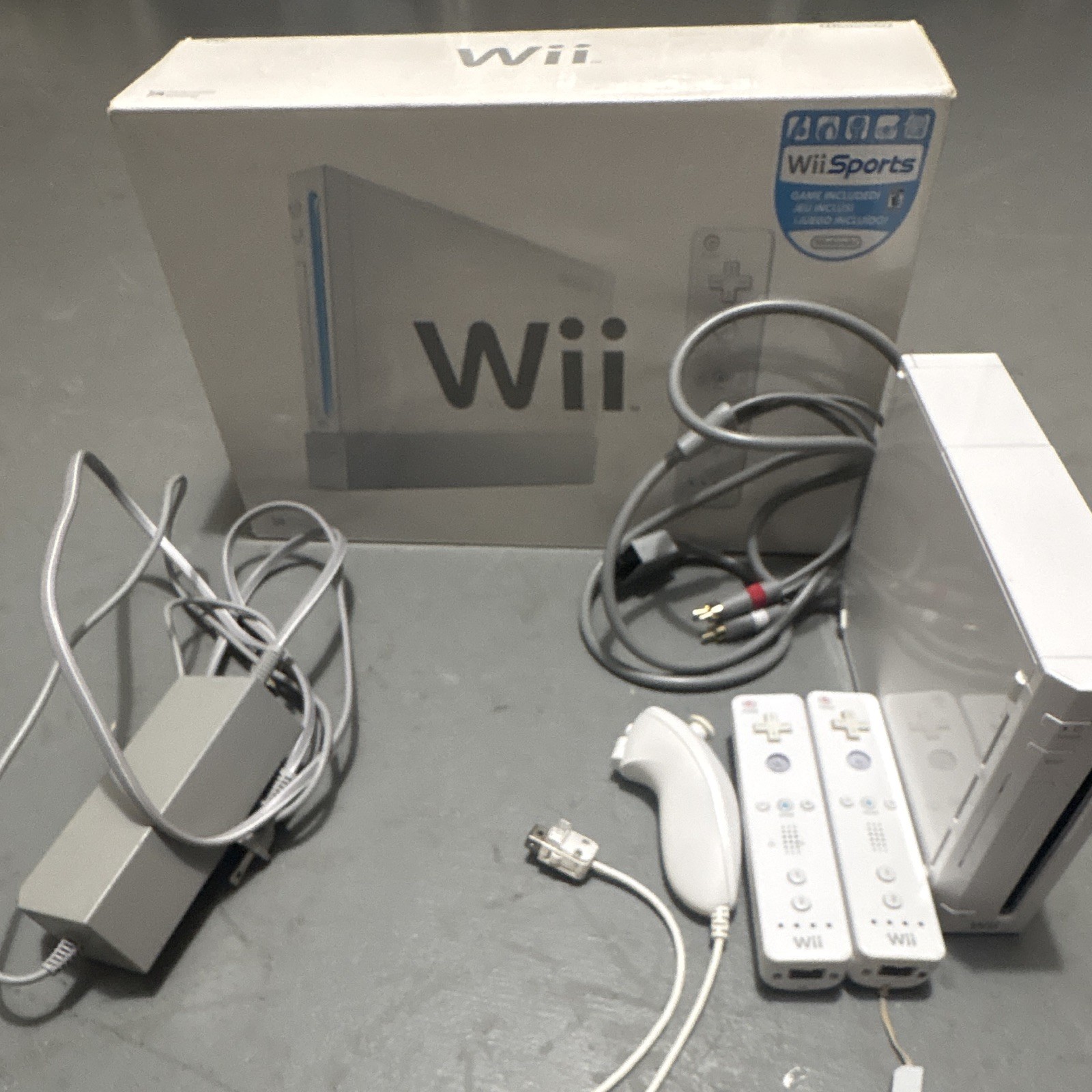 Nintendo Wii Console White with Wii Sports, 2 Remotes, Nunchuk, Box
