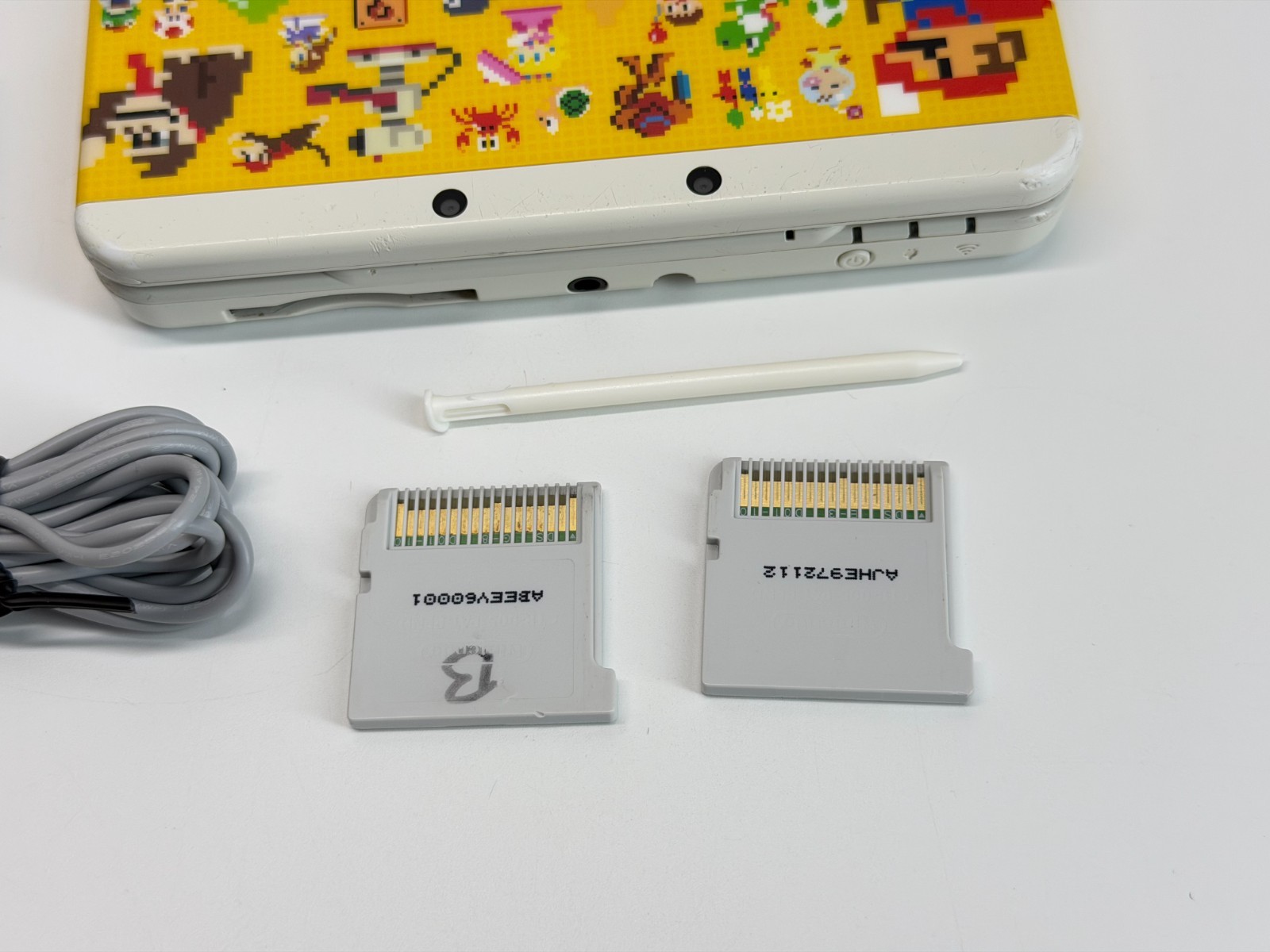 New Nintendo 3DS Handheld System Mario Edition Bundle w/Mario Bros 2 & Maker