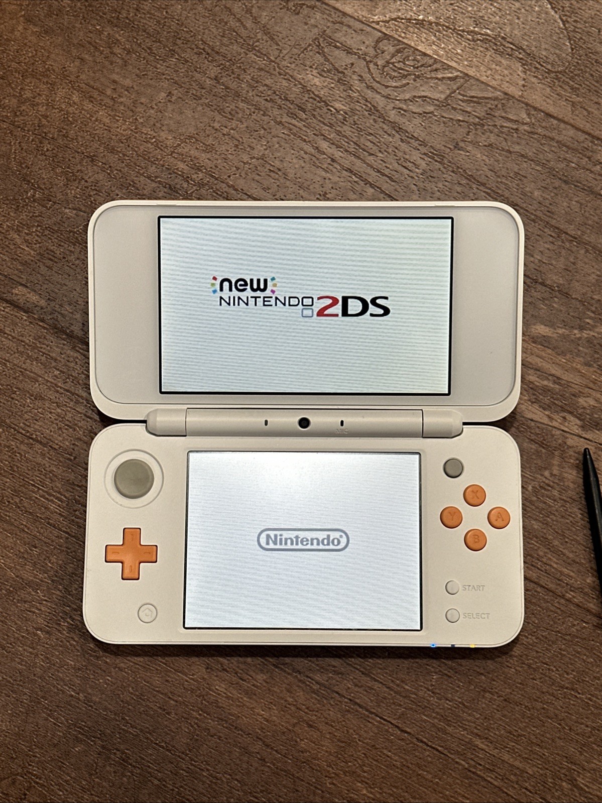 Nintendo “New” 2DS XL Handheld Console – White/Orange – Tested – Case & 7 Games
