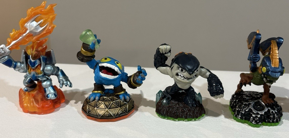 7 ASSORTED ACTIVISION SKYLANDERS VIDEO GAME FIGURES PHANTOM CYNDER MINI JIN