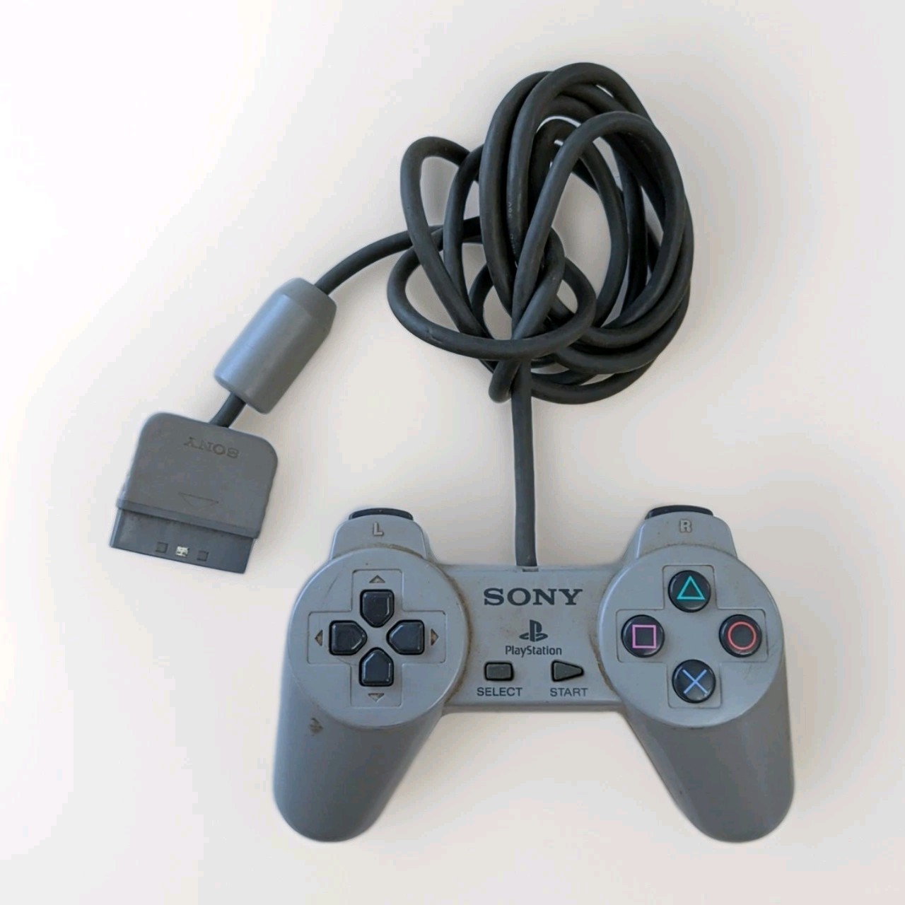 Sony PlayStation 1 Light Gray Controllers (x2) – Untested