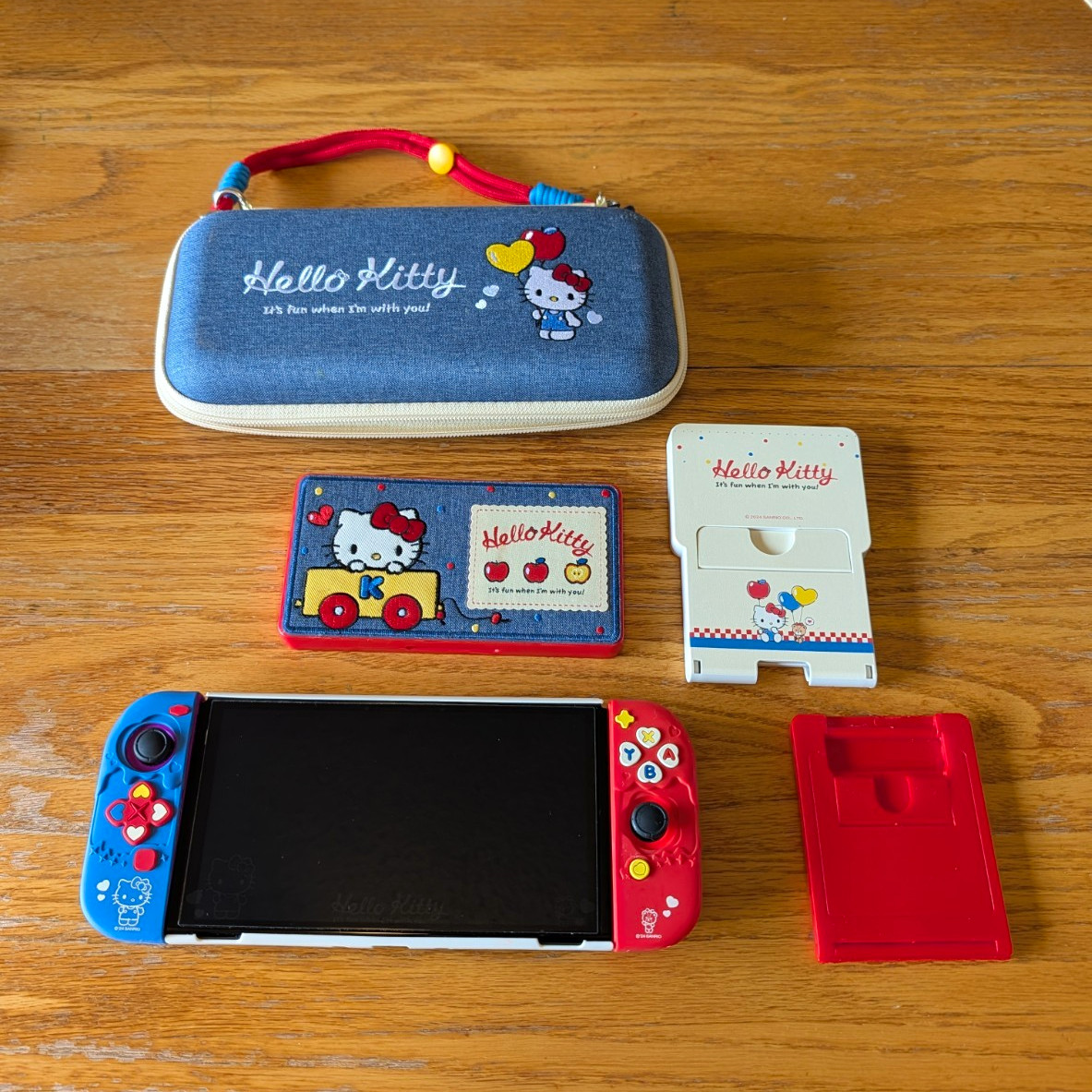 OLED Nintendo Switch + Hello Kitty Accessories