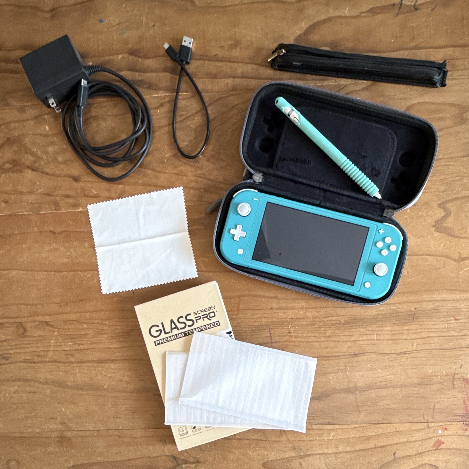 Nintendo Switch Lite Blue Bundle w/ Case, Charger, screen protectors, & stylus