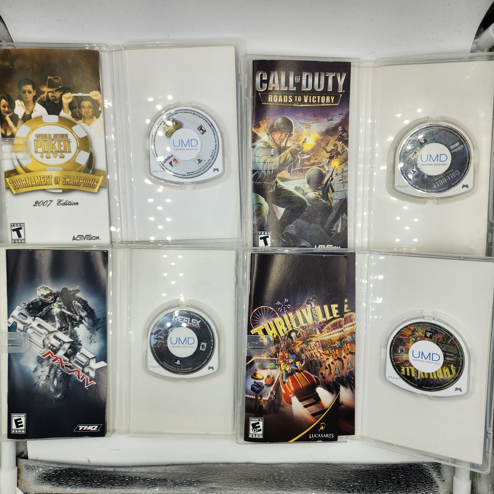 Lot of 16 Assorted PSP UMD Games w/ Manuals *pre-owned
