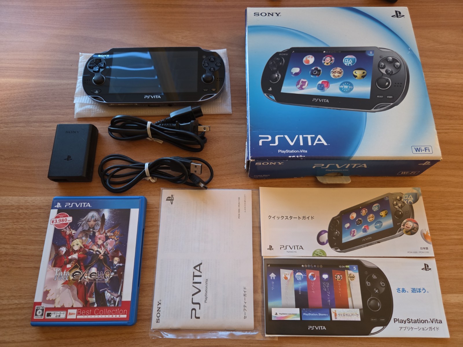 Sony Ps Vita PCH-1000 black Crystal Model Console & Charger CIB TESTED