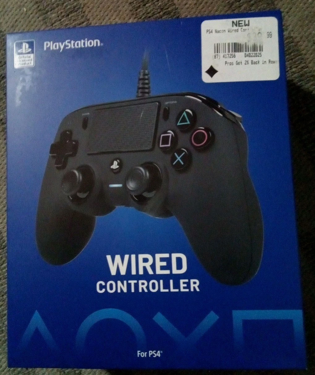 Nacon Wired Controller for PlayStation 4.Black NEW SEALED IN BOX. Official Sony