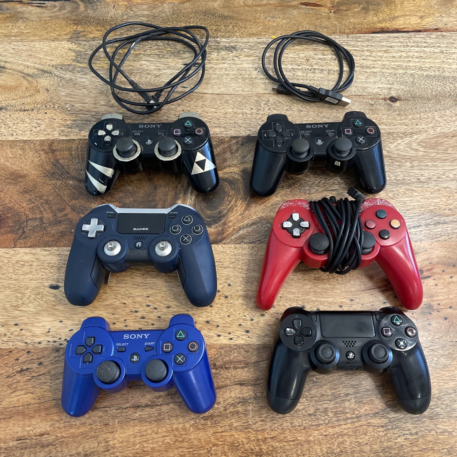 Lot Of 6 PlayStation Controllers Various Models/Colors Untested Selling As Is!