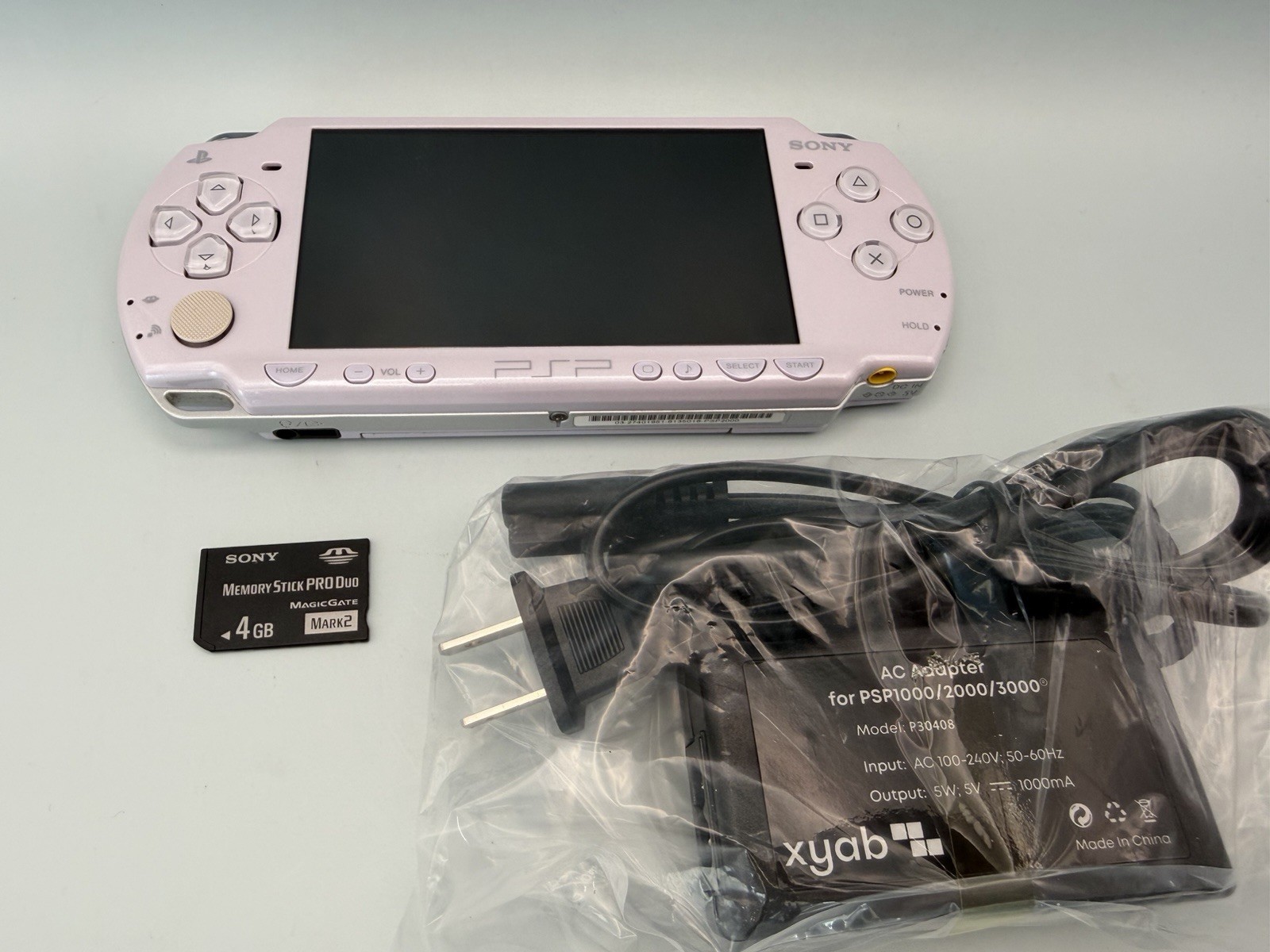 Sony PSP 2000 Console Lavender Purple – New Battery + 4GB Memory Card + Charger