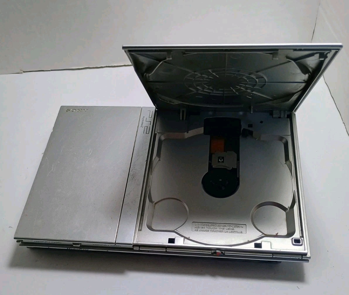 PS2 Silver Slim Console Only *AS IS* FOR PARTS REPAIR *No AV Signal*