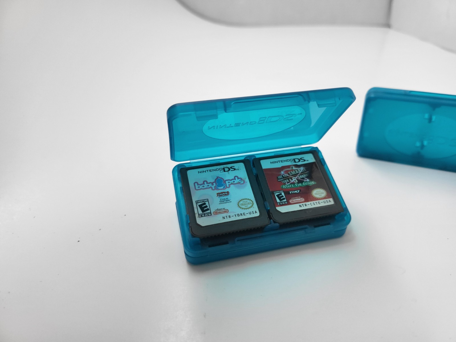 3 NEW OFFICIAL NINTENDO DS CLEAR BLUE 4 GAME CARTRIDGE CASE HOLDER 12 TOTAL #G5