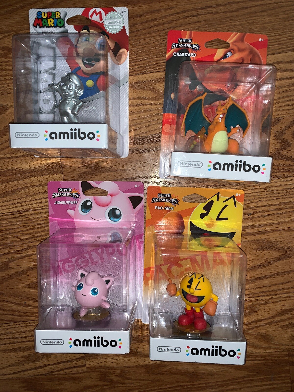 Amiibo Mario Silver Edition, Charizard, Pac-man, Jigglypuff No Returns Accepted