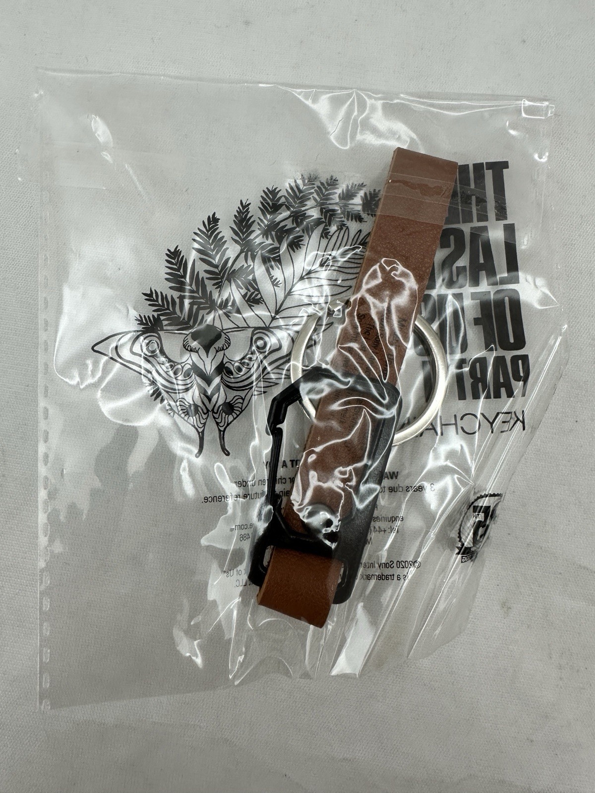 The Last of Us Part II – Promo Keychain RARE – 35th Anniversary Naughty Dog