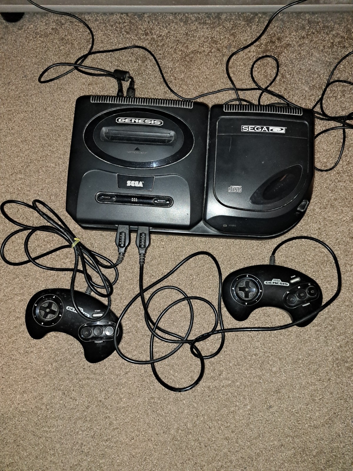 Sega Genesis CD Console. Comes with all of the cords, 2 controllers, and 3 games