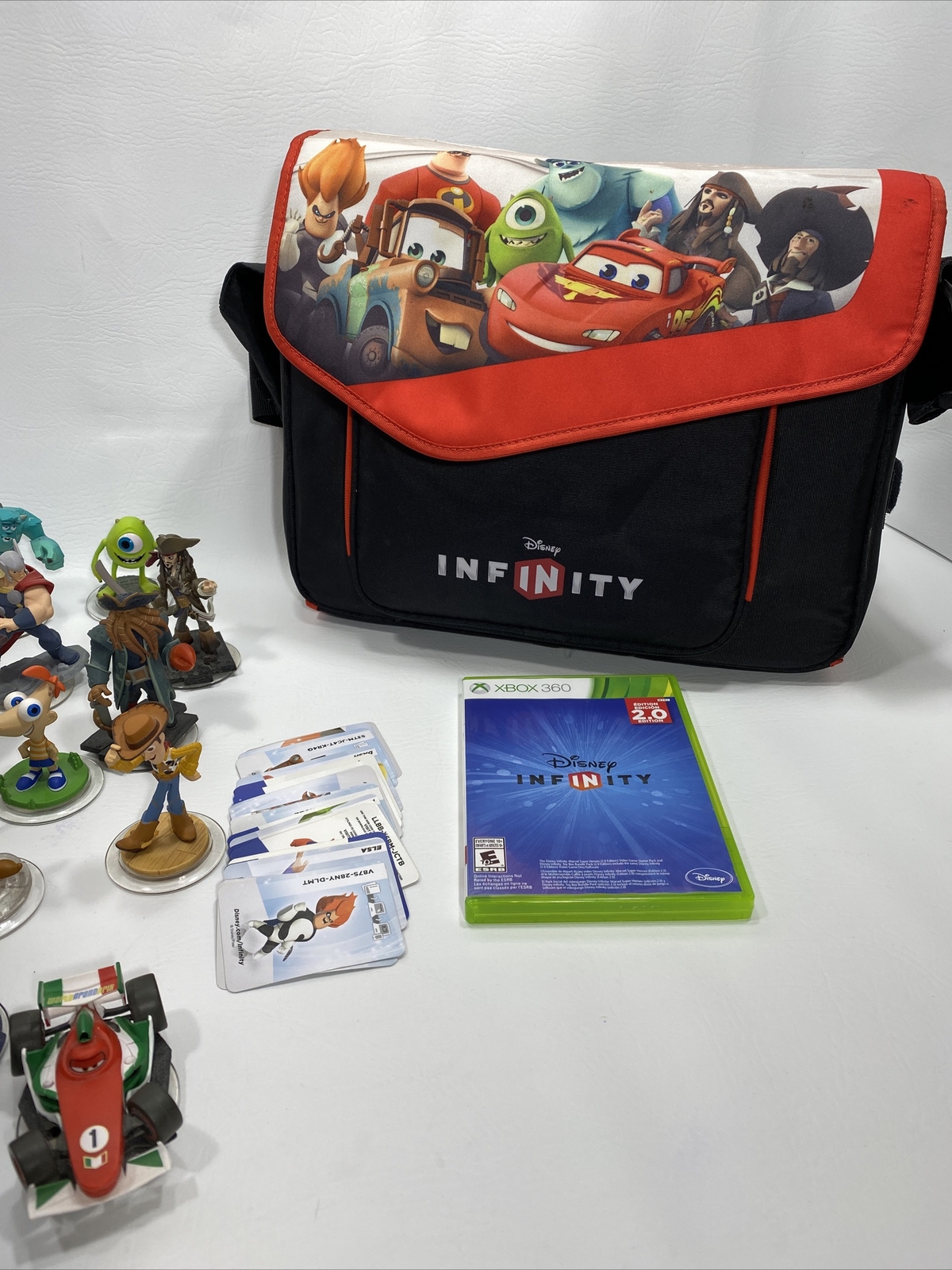 Disney Infinity Lot Of 26 Figures, XBOX Game 2.0, Roll Out Shoulder Bag, Cards