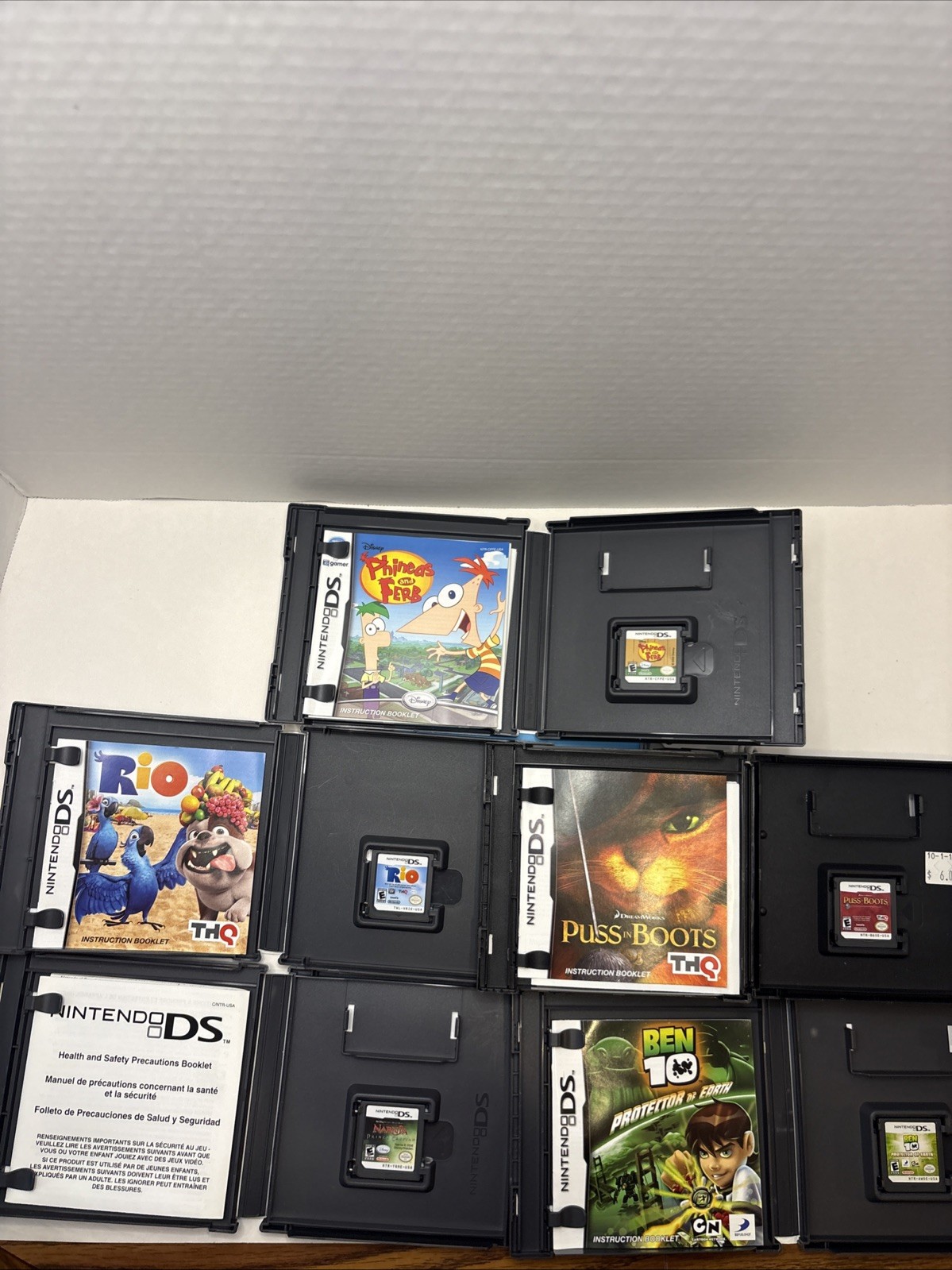 Nintendo DS Handheld System Blue with Aftermarket Charger, Stylus, And Game Lot!