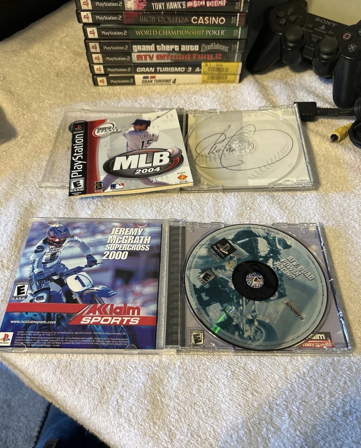 PlayStation 1, 2, & 3 Game lot. 19 total games & PS2 wired controller. Used