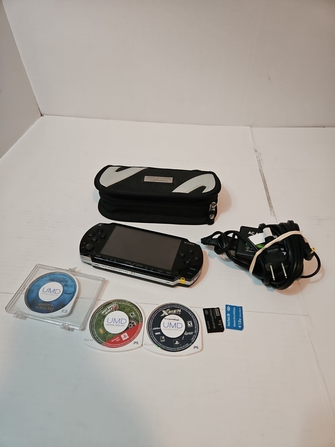 Sony PlayStation PSP-1001 Black Console Cards Charge Case 2 Games 1 Movie READ