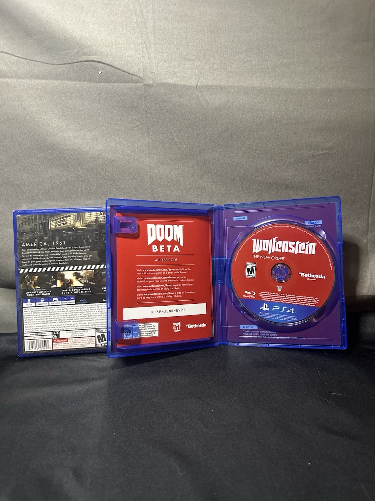 Wolfenstein Videogame Bundle – The New Colossus (sealed) & The New World Order