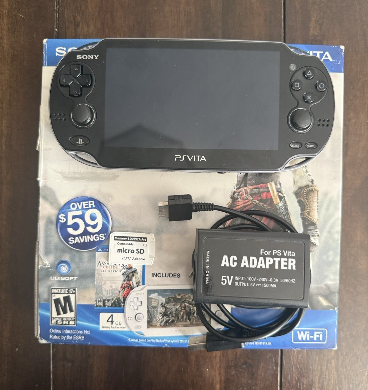 Sony PS Vita 1000, OLED Black Console w/ a box, Manuals, charger, sd2vita