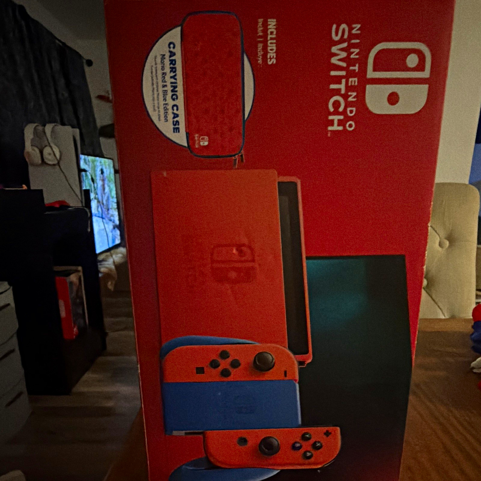 Nintendo Switch Console Red/Blue Handheld System w/ Carrying Case