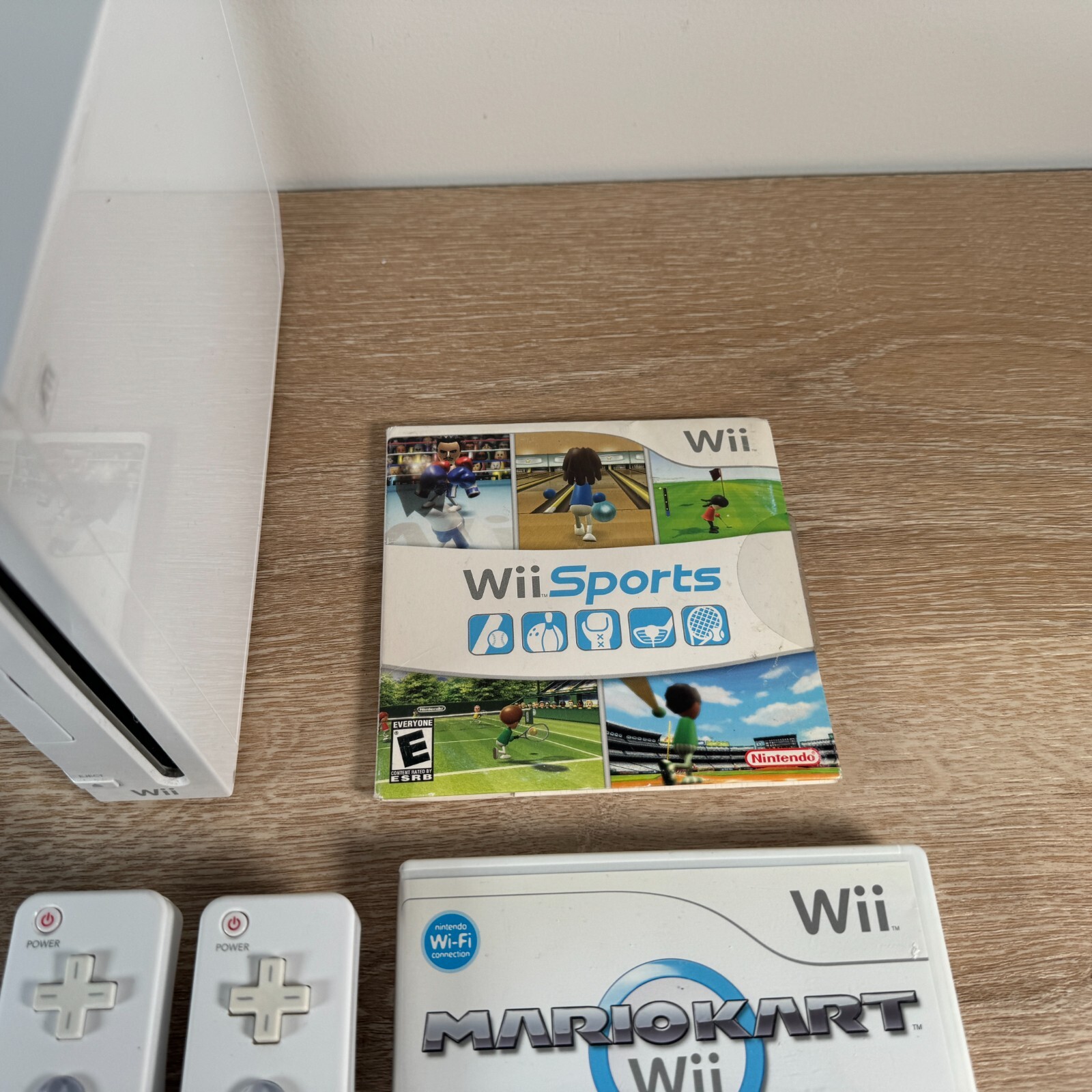 Nintendo Wii Console Mario Kart Bundle with Wii Sports, 2 Controllers & 2 Wheels