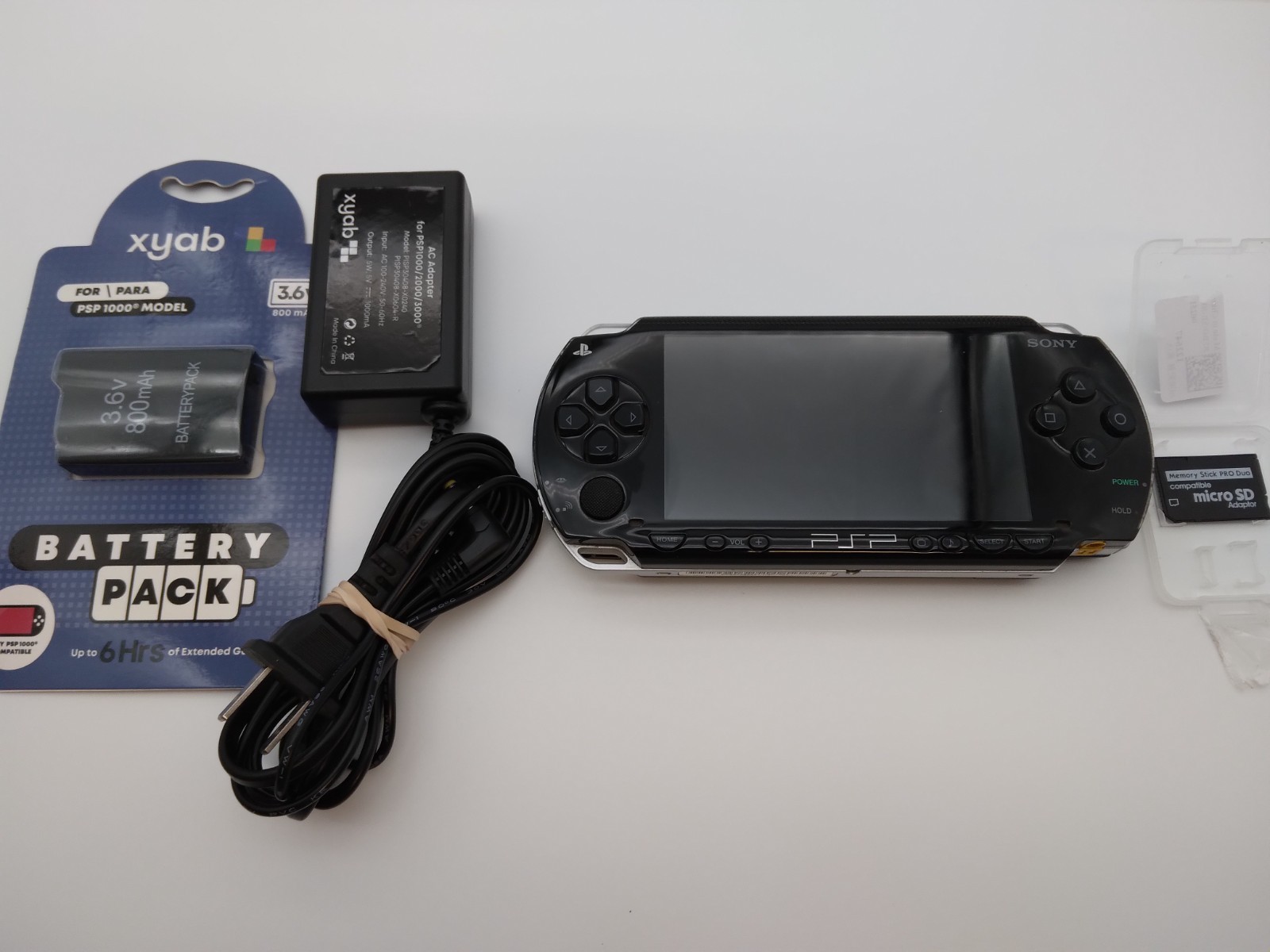 Sony PlayStation Portable PSP 1001 Handheld Console Piano Black