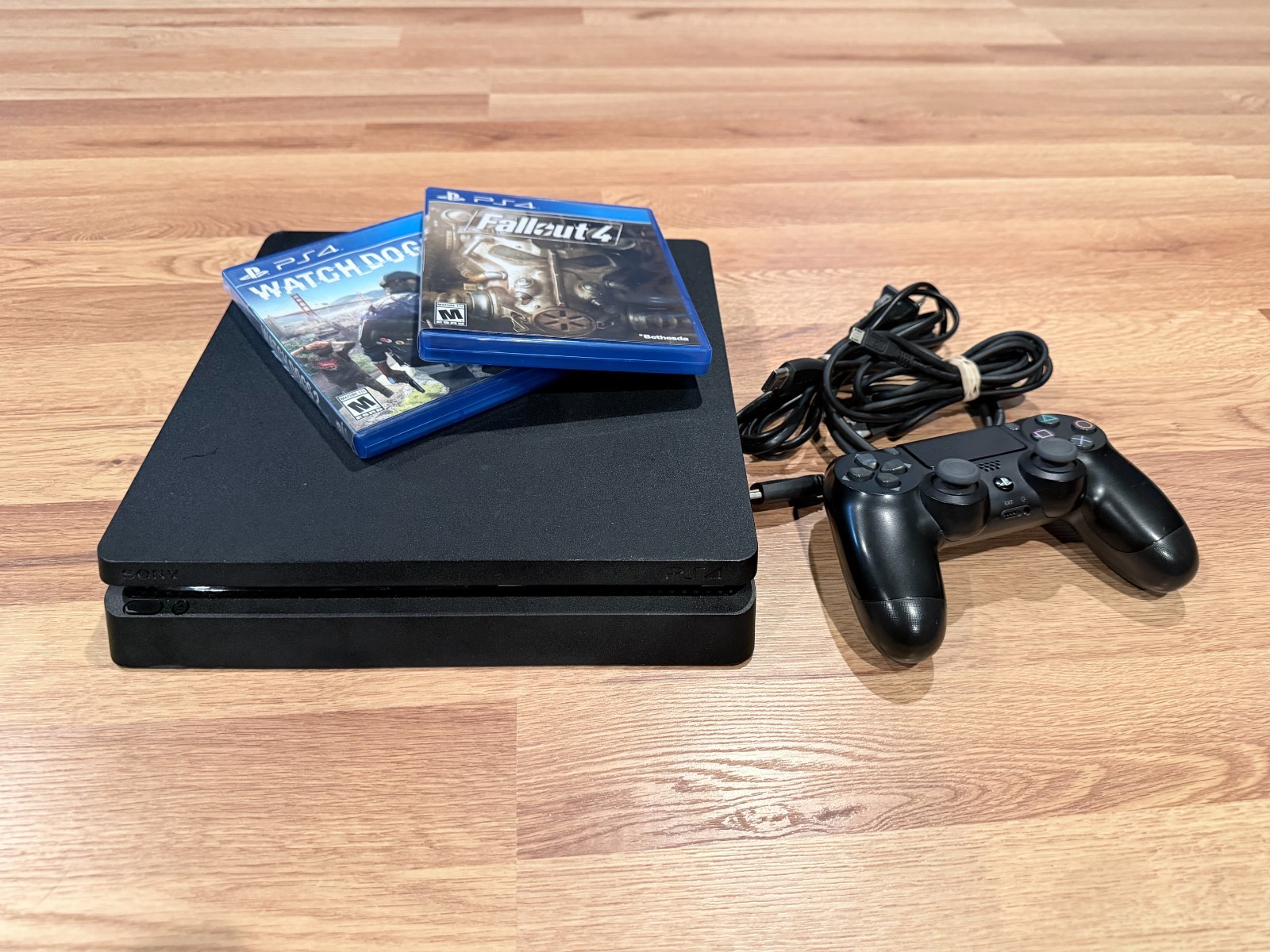 Sony PlayStation 4 Slim 500GB Bundle – Cleaned, Tested & Ready to Play