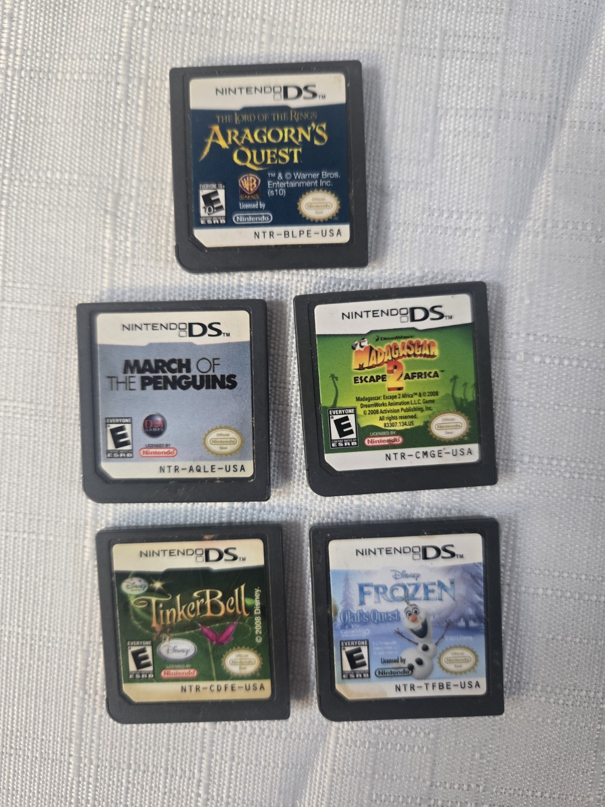 Nintendo DS Game Lot of 5 Cartridges Tinker Bell Frozen Madagascar Aragorn B34