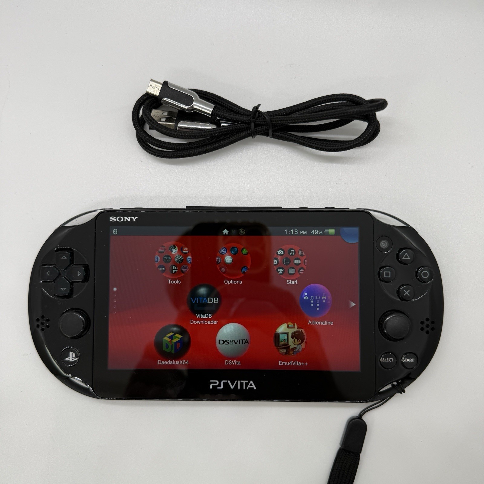 Sony PS Vita PCH-2000 Black Handheld Console + Charger + 64GB SD Card
