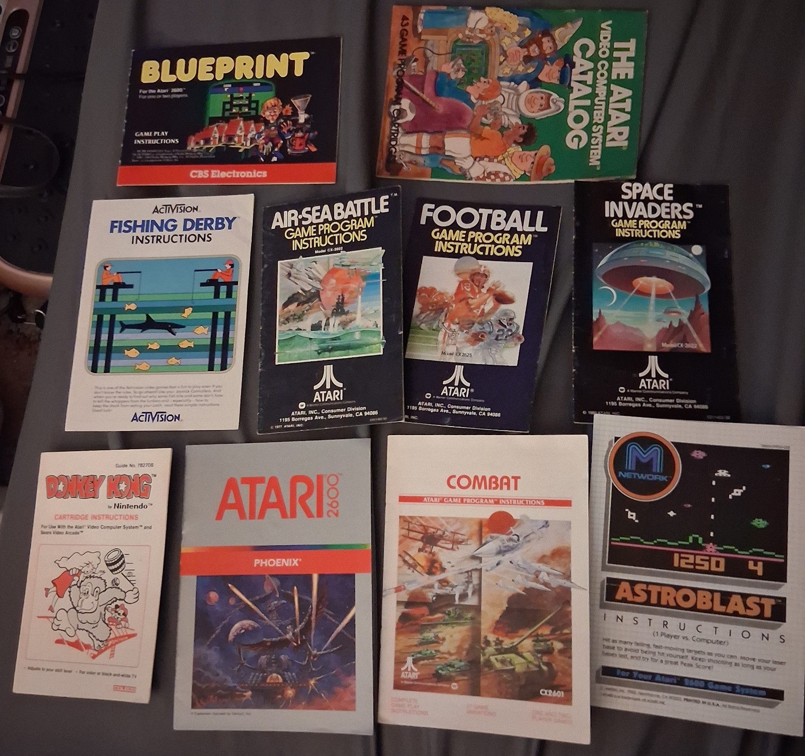 Atari 2600 LOT of 10 Manuals Blueprint Phoenix Astroblast Combat Fishing Derby