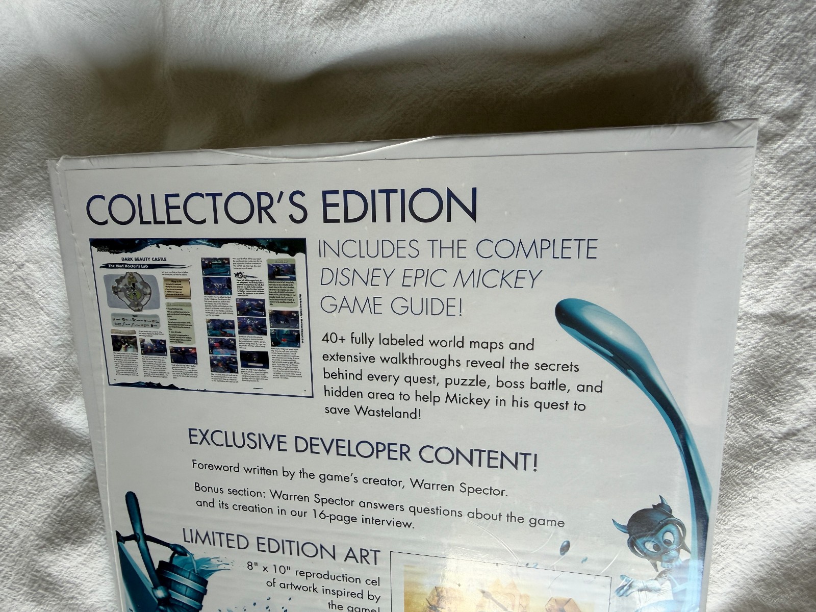 Disney Epic Mickey Collector’s Edition Strategy Guide Hardcover & Art Cell – NEW