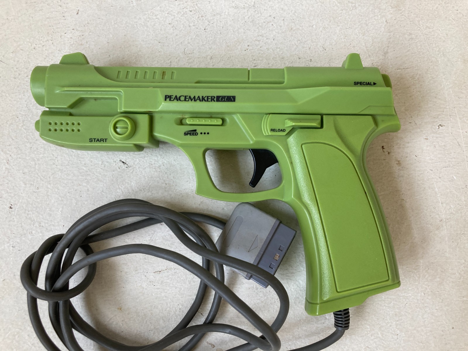 Nuby Peacemaker Light Gun Controller for Sony PlayStation 1 PS1 Green Untested