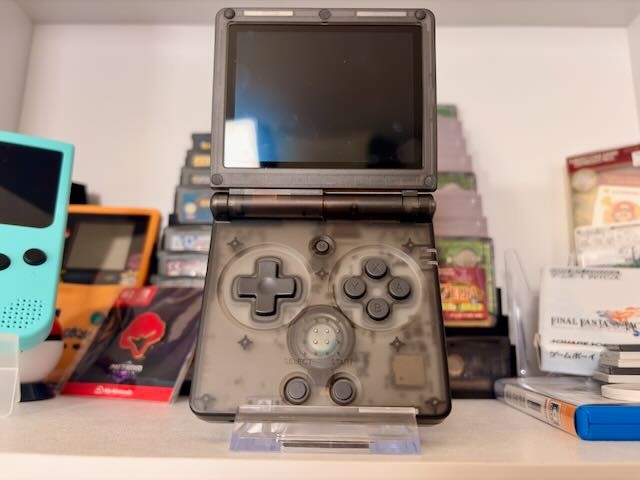 Anbernic RG35XX SP Retro Clamshell Handheld Game Console Black Trasnparent