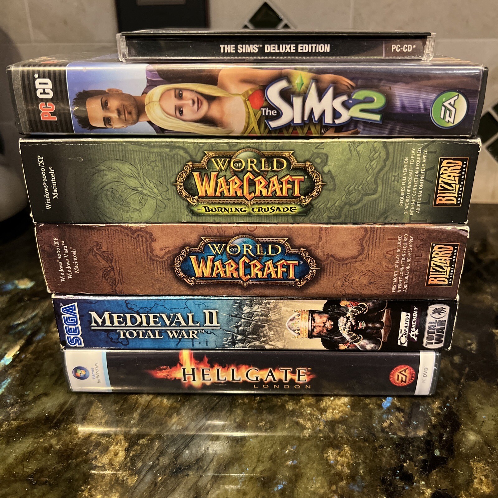 6 PC DVD-Rom Games Hellgate, Medieval II Total War, World Of WarCraft, Sims Lot