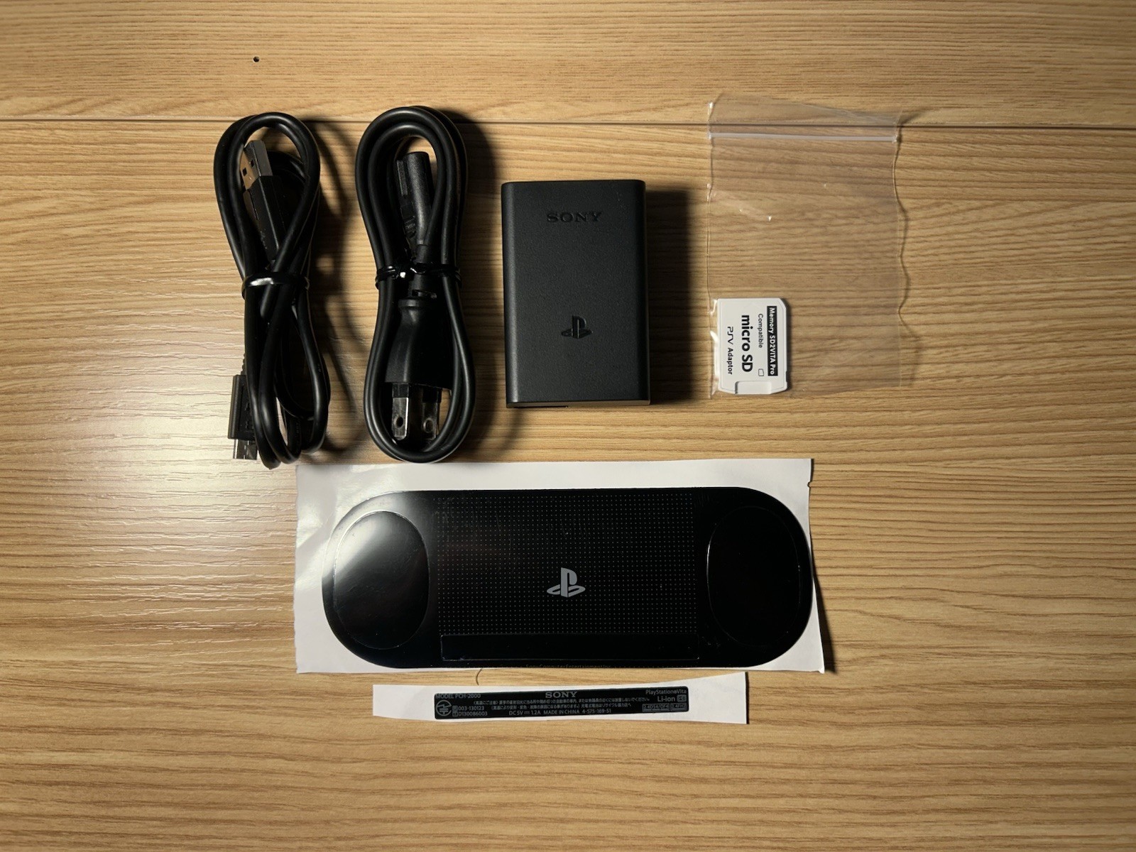 Silver Sony PS Vita PCH-2000 Region Free 8GB Handheld Bundle w/ Accessories
