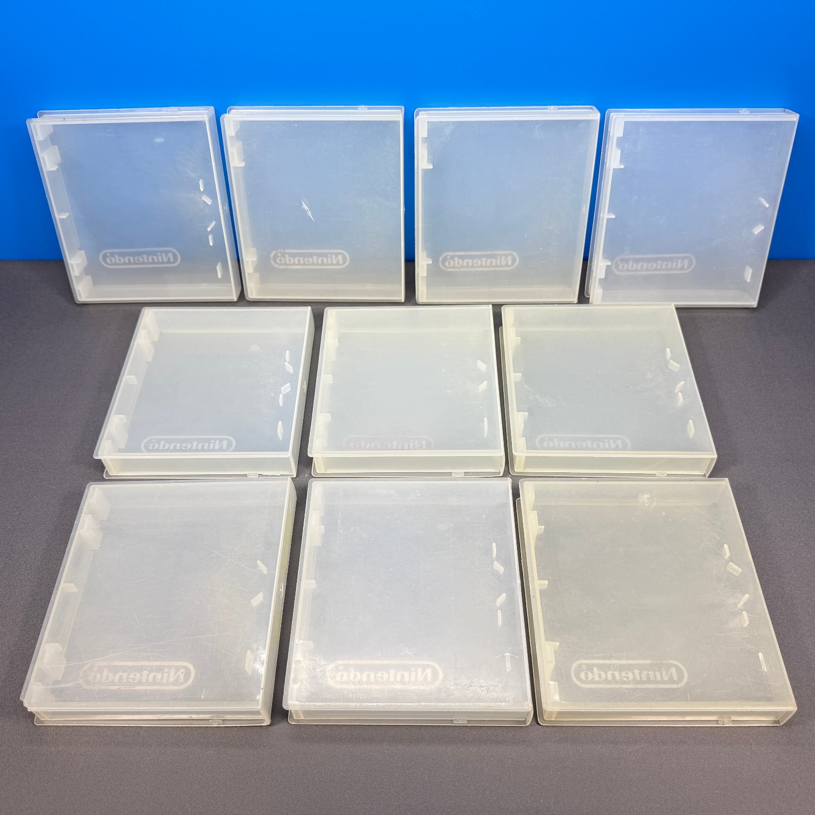 LOT OF 10 NINTENDO NES GAME HARD PLASTIC CLAMSHELL CASE CASES CLEAR RED LOGO OEM