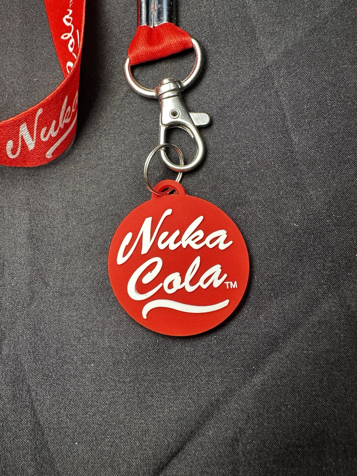 Lot of Bethesda Fallout Nuka Cola Bottle Caps, Beanie Hat, Lanyard & Keychain